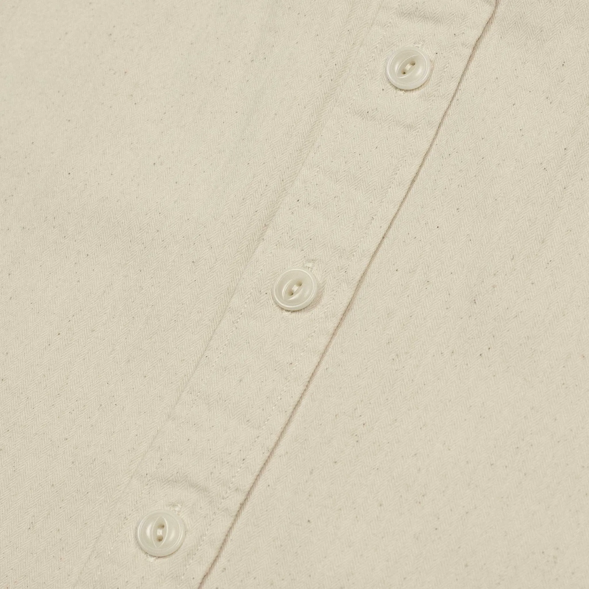 Chainstitched workshirt in natural undyed cotton herringbone